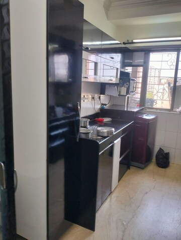 Kitchen in 3 BHK Apartment at Juhu Abhishek Chs Ltd, Andheri West – for Rent