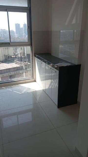 Kitchen in 2 BHK Apartment at Godrej Tranquil, Kandivali East – for Rent