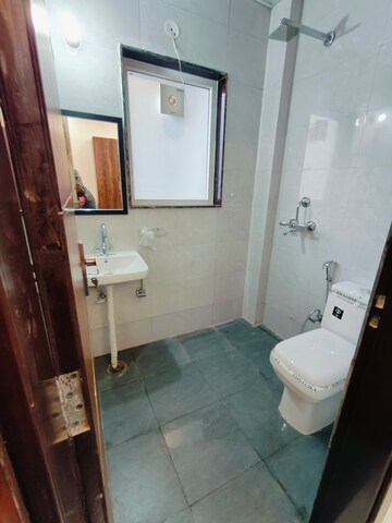 Bathroom in 1 RK Builder Floor at Ansal Sushant Lok I, Sector 43 – for Rent