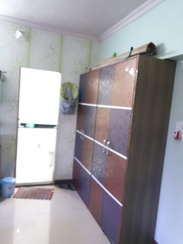 Room in 1 BHK Apartment at Dheeraj Uphar CHS. LTD., Malad East – for Rent