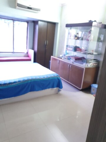 Bedroom in 1 BHK Apartment at Dheeraj Uphar CHS. LTD., Malad East – for Rent
