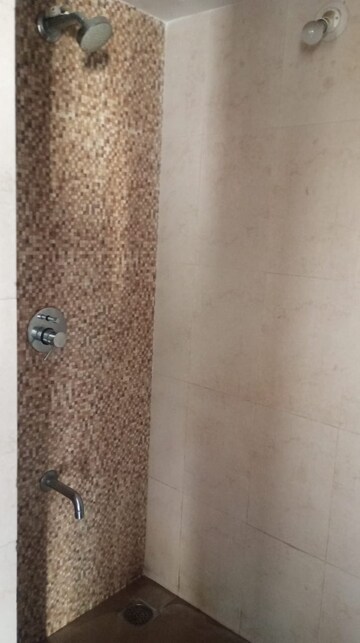 Bathroom in 1 BHK Apartment at Lodha Lakeshore Greens, Dombivli East – for Rent