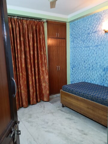Bedroom in 2 BHK Builder Floor at Khirki Extension – for Rent