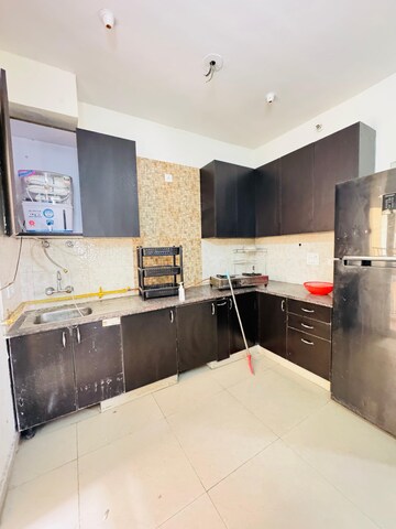 Kitchen in 3 BHK Apartment at ABA Cleo County, Sector 121 – for Rent