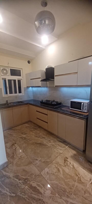 Kitchen in 3 BHK Builder Floor at Patiala Road – for Sale