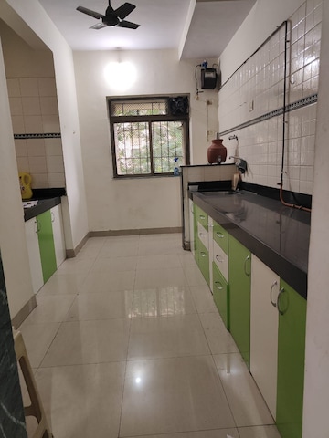 Kitchen in 2 BHK Apartment at Shubharambh Complex, Manpada – for Rent