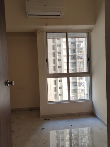 Room in 1 BHK Apartment at Lodha Amara, Kolshet Road – for Rent