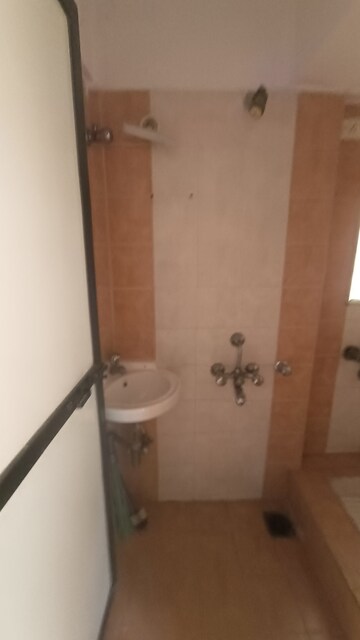 Bathroom in 2 BHK Apartment at Bahar CHS, Goregaon East – for Rent