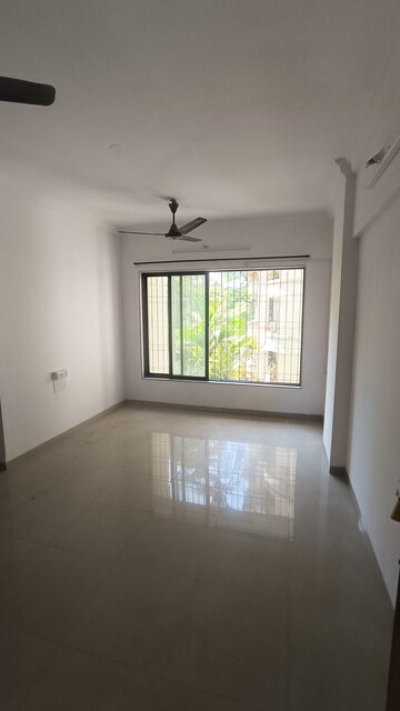 Room in 2 BHK Apartment at Bahar CHS, Goregaon East – for Rent