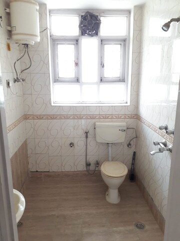 Bathroom in 3 BHK Apartment at South City Arcade, Sector 41 – for Rent