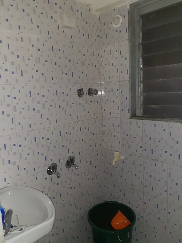 Bathroom in 1 BHK Apartment at Bhoomi SRA CHS, Goregaon East – for Rent