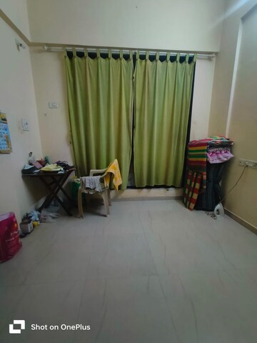 Living Room in 1 BHK Apartment at Shruti CHS Kopar, Kopar Khairane – for Sale