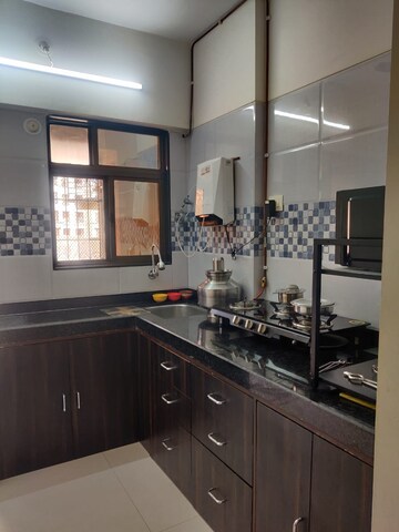 Kitchen in 2 BHK Apartment at Rosa Bella, Ghodbunder Road – for Rent