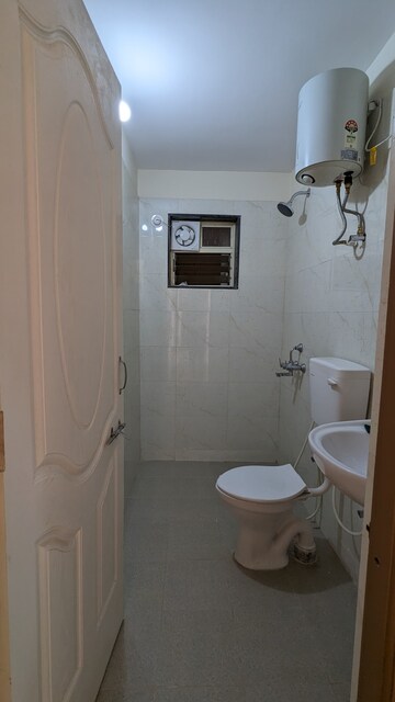 Bathroom in 1 BHK Apartment at Kadamba Plateau – for Rent
