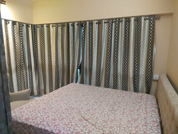 Bedroom in 2 BHK Apartment at Kanakia Rainforest, Andheri East – for Rent