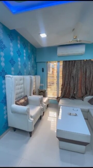 Living Room in 2 BHK Apartment at Unique Signature Mumbai, Mira Road – for Rent