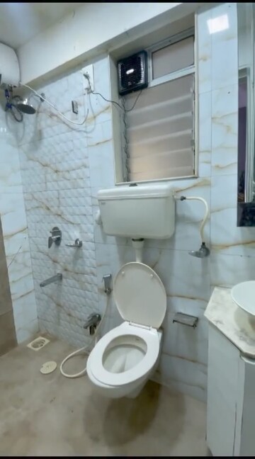 Bathroom in 2 BHK Apartment at Unique Signature Mumbai, Mira Road – for Rent