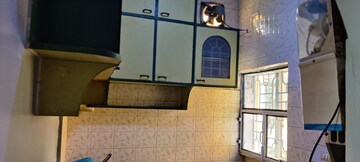 Living Room in 2 BHK Apartment at Orlem Peace, Malad West – for Rent