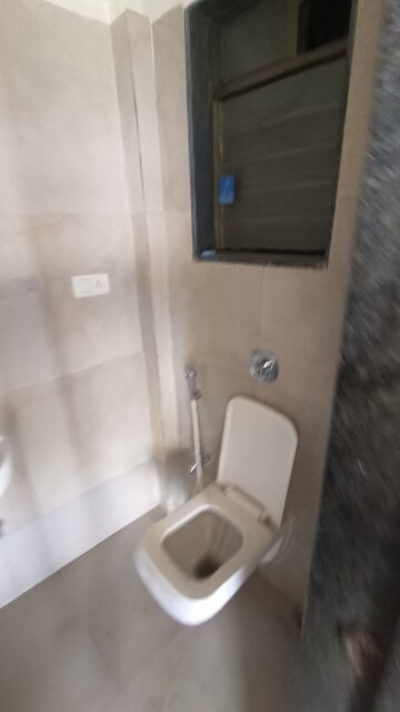 Bathroom in 1 BHK Apartment at Conwood Astoria, Goregaon East – for Rent