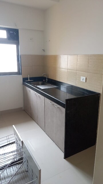 Kitchen in 2.5 BHK Apartment at Lodha Splendora Tierra, Ghodbunder Road – for Sale