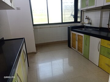 Kitchen in 2 BHK Apartment at Arjun CHS Vasant Vihar, Vasant Vihar – for Rent