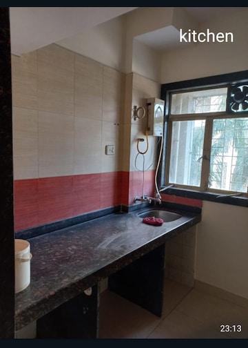 Kitchen in 1 BHK Apartment at Raunak Heights, Ghodbunder Road – for Rent