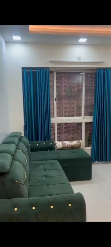 Living Room in 2 BHK Apartment at Lodha Amara, Kolshet Road – for Sale