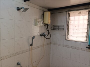Bathroom in 1 BHK Apartment at Brahmand CHS, Brahmand – for Rent