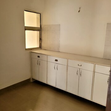 Kitchen in 2 BHK Apartment at Amrapali Silicon City, Sector 76 – for Rent