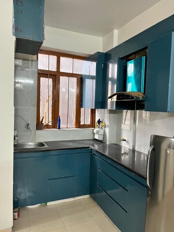 Kitchen in 1.5 BHK Apartment at Auric City Homes, Sector 82 – for Rent