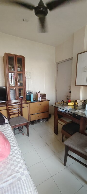 Living Room in 1 BHK Apartment at Raj Shivam Society, Dahisar East – for Sale
