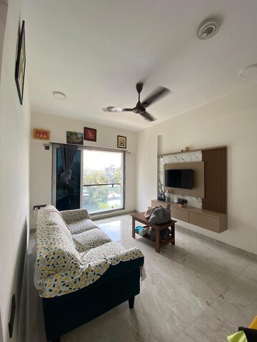 Living Room in 1 BHK Apartment at Devika Towers, Collectors Colony – for Sale