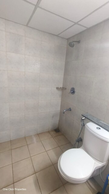 Bathroom in 2.5 BHK Apartment at Bhartiya City Nikoo Homes II, Thanisandra Main Road – for Rent