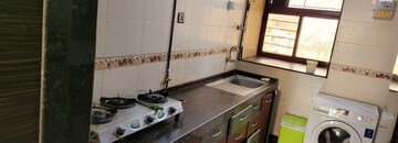Kitchen in 4 BHK Apartment at Bhumiraj Hermitage, Sanpada – for Sale