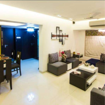 Living Room in 2 BHK Apartment at Palash Towers, Veera Desai Industrial Estate – for Rent