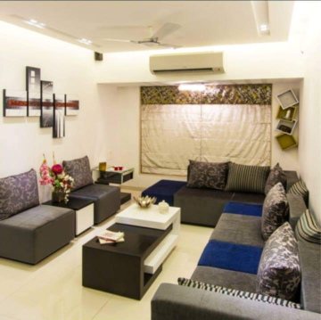 Living Room in 2 BHK Apartment at Palash Towers, Veera Desai Industrial Estate – for Rent