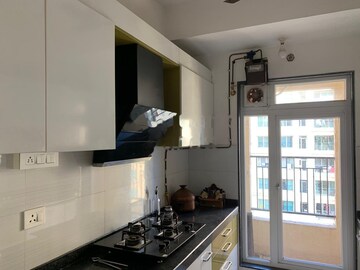 Kitchen in 2 BHK Apartment at Rustomjee Urbania, Majiwada – for Rent