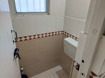 Bathroom in 2 BHK Apartment at Shanti Residency, Hadapsar – for Rent