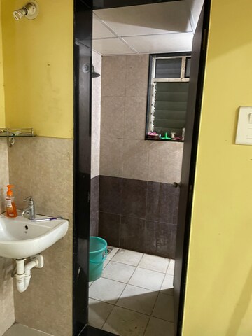 Bathroom in 1 BHK Apartment at Paranjape Schemes Madhukosh, Dhayari – for Rent