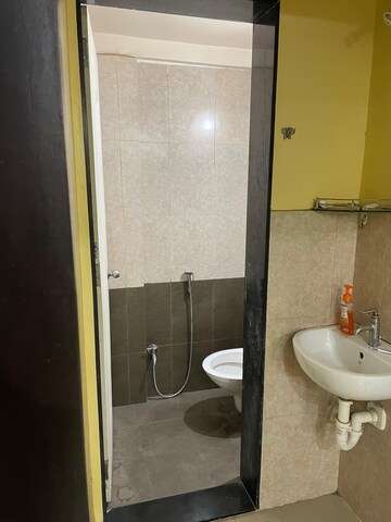Bathroom in 1 BHK Apartment at Paranjape Schemes Madhukosh, Dhayari – for Rent