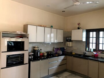 Kitchen in 3 BHK Apartment at Western Springs, Puppalaguda – for Sale