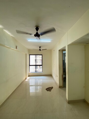 Living Room in 1 BHK Apartment at Lodha Crown Quality Homes Dombivli, Dombivli East – for Rent