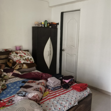Bedroom in 2 BHK Apartment at Mahaavir Jyoti, Kharghar Sector 10 – for Rent