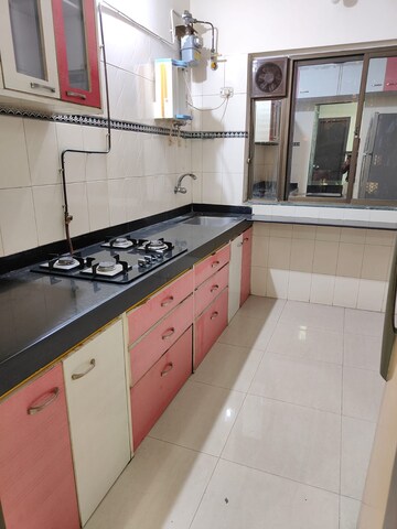 Kitchen in 2 BHK Apartment at Kabra Hyde Park, Manpada – for Rent