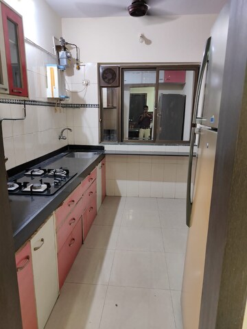 Kitchen in 2 BHK Apartment at Kabra Hyde Park, Manpada – for Rent