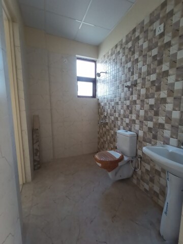 Bathroom in 4 BHK Apartment at Adore Legend, Sector 84 – for Sale
