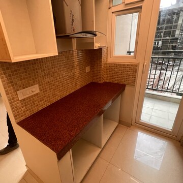 Kitchen in 2 BHK Apartment at Eldeco Live By The Greens, Sector 150 – for Sale