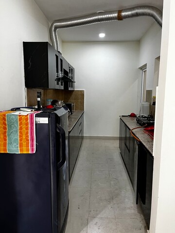 Kitchen in 3 BHK Apartment at Pardos Okas Enclave, Sushant Golf City – for Rent