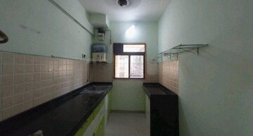 Kitchen in 1 BHK Apartment at Swastik Residency 1, Ghodbunder Road – for Rent