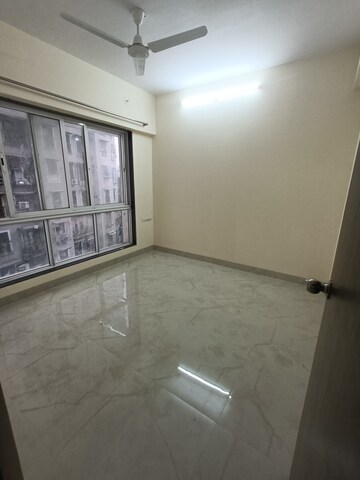 Master Bedroom in 2 BHK Apartment at Sanjar Fortune Heights, Kandivali West – for Rent